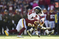 <p>Tight end Austin Hooper #81 of the Atlanta Falcons is tackled by free safety Ha Ha Clinton-Dix #20 of the Washington Redskins in the second quarter at FedExField on November 4, 2018 in Landover, Maryland. (Photo by Patrick McDermott/Getty Images) </p>