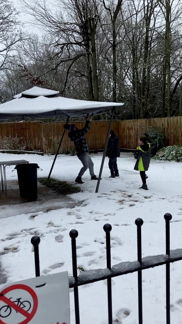 This is the moment a dad tried to cover his kids in snow from the top of his gazebo - only for it to completely collapse on top of him. Daniel Campbell, 34, tried to scrape off a bit of snow that had settled on the roof of the structure onto his kids Kacey, 15, Finley, 10, and Nate, seven, while wife Lucy, 34, filmed. But after failing to give them the shower he desired, his plan backfired and the gazebo collapsed on his head, leaving the whole family in hysterics.