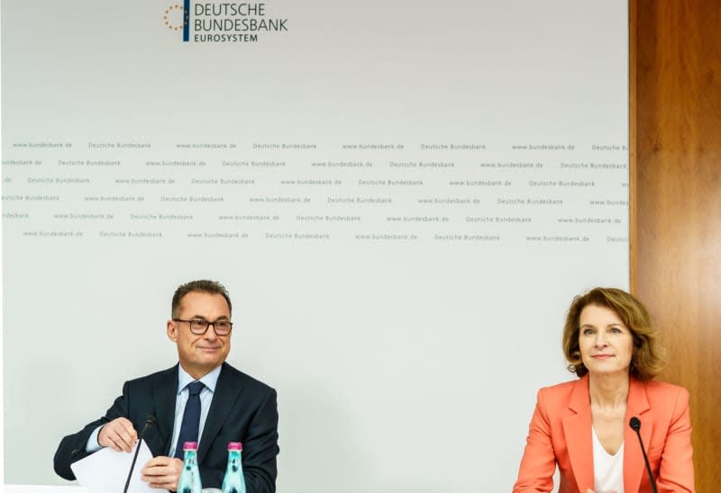 Joachim Nagel (L), President of the German Bundesbank, and Sabine Mauderer, member of the Bundesbank's Executive Board, present the Annual Report for 2023 during a press conference at the German Bundesbank. Andreas Arnold/dpa