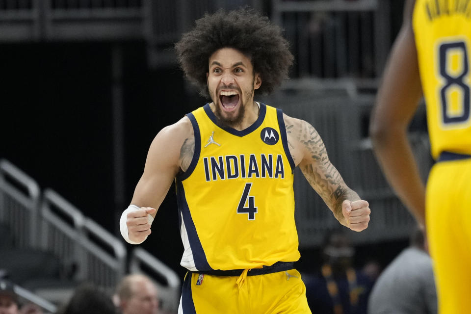 Indiana Pacers guard Duane Washington Jr. (4) celebrates a basket while playing the Chicago Bulls during the second half of an NBA basketball game in Indianapolis, Friday, Feb. 4, 2022. (AP Photo/AJ Mast)