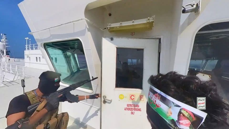 This handout screen grab captured from a video shows Yemen's Houthi fighters' takeover of the Galaxy Leader Cargo in the Red Sea coast off Hudaydah, on November 20 in the Red Sea, Yemen. - Houthi Movement via Getty Images