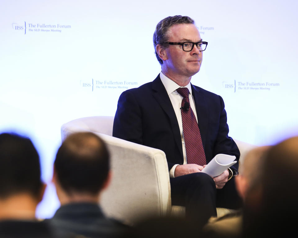 Australian Defense Minister Christopher Pyne waits to deliver his keynote address during the International Institute for Strategic Studies (IISS) Fullerton Forum in Singapore, Monday, Jan. 28, 2019. (AP Photo/Yong Teck Lim)