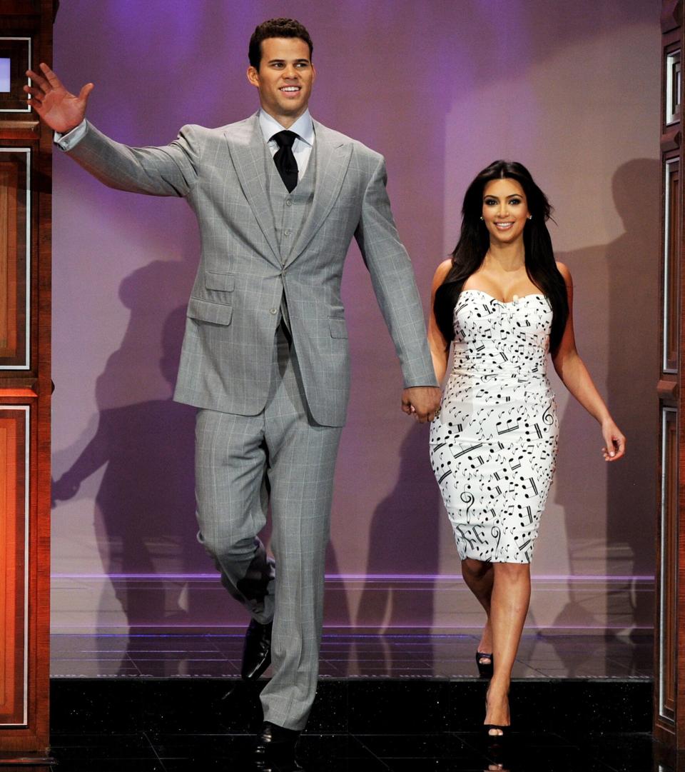 Kris Humphries (L) and his wife reality TV personality Kim Kardashian appear on the Tonight Show With Jay Leno at NBC Studios on October 4, 2011 in Burbank, California