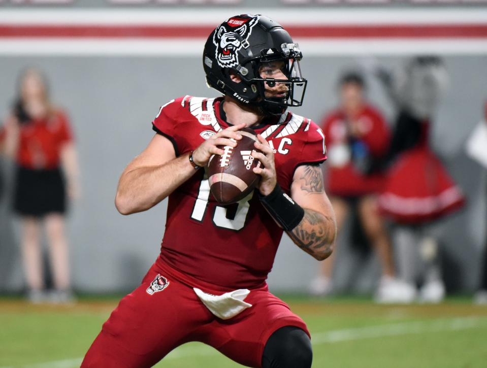 North Carolina State quarterback Devin Leary looks to throw during the first half against Connecticut at Carter-Finley Stadium in Raleigh, N.C., on Sept. 24, 2022.