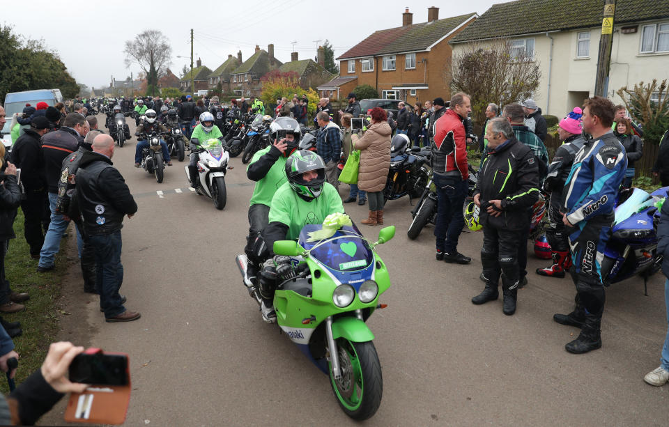 A motorbike convoy makes it's way through the village of Charlton after following Harry Dunn's last ride as a tribute to the teenager who died when his motorbike was involved in a head-on collision near RAF Croughton, in Northamptonshire in August.