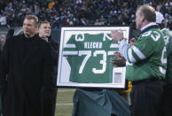 FILE - New York Jets' Joe Klecko, left, had his jersey retired Sunday, Dec. 26, 2004, at Giants Stadium in East Rutherford, N.J. Super Bowl MVP Chuck Howley and All-Pro defenders Joe Klecko and Ken Riley are finalists for the Pro Football Hall of Fame’s class of 2023. The defenders who starred in the 1960s, 70s and 80s were announced Wednesday, Aug. 17, 2022, as the three senior candidates for next year's Hall of Fame class from a list of 12 semifinalists. (AP Photo/Bill Kostroun, File)