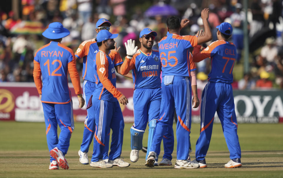 Indian players celebrate a wicket during the T20 cricket between Zimbabwe and India at Harare Sports club,Sunday, July 7,2024. (AP Photo/Tsvangirayi Mukwazhi)