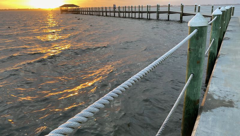 The Indian River is pictured in this 2019 file photo from Melbourne Beach, Florida. The bacteria Vibrio vulnificus is often found in warm water, its range spreading. Now 13 people have died from the flesh-eating infection the bacteria can cause.