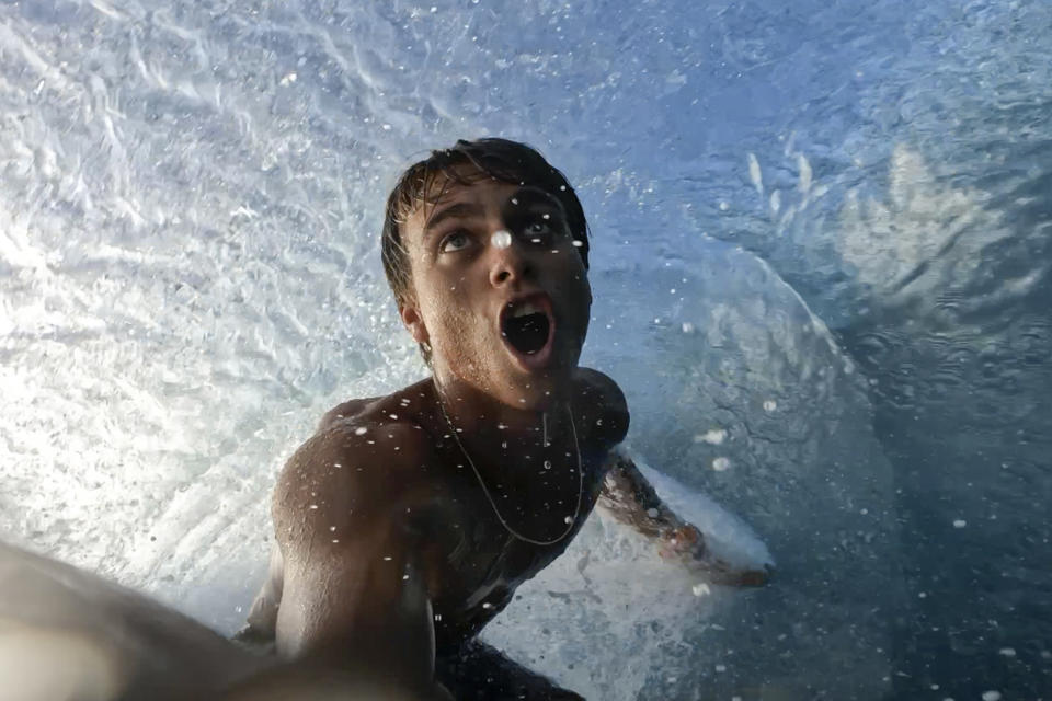 In this undated screen grab, Tahitian-born surfer Kauli Vaast films himself surfing on the world-famous Teahupo’o wave in Tahiti. The 21-year-old is among athletes qualified for the Olympic surfing competition that will be held next July at Teahupo’o, as part of the 2024 Summer Games in Paris.” (Kauli Vaast via AP)