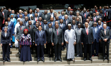 Japan's Prime Minister Shinzo Abe joins African leaders for a group photograph during a break session for the Sixth Tokyo International Conference on African Development (TICAD VI) in Kenya's capital Nairobi, August 27, 2016. REUTERS/Thomas Mukoya