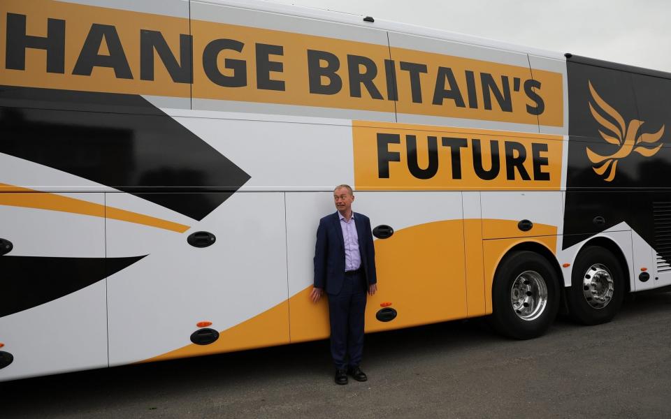 KIDLINGTON, ENGLAND - MAY 03: Liberal Democrat leader Tim Farron pins himself against his 'Battle Bus' to let a passing car come by after a campaign event on May 3, 2017 in Kidlington, a village outside of Oxford, England. The country goes back to the polls for the second time in two years as a general election is held on June 8. (Photo by Dan Kitwood/Getty Images)  - Credit: Dan Kitwood/ Getty Images Europe