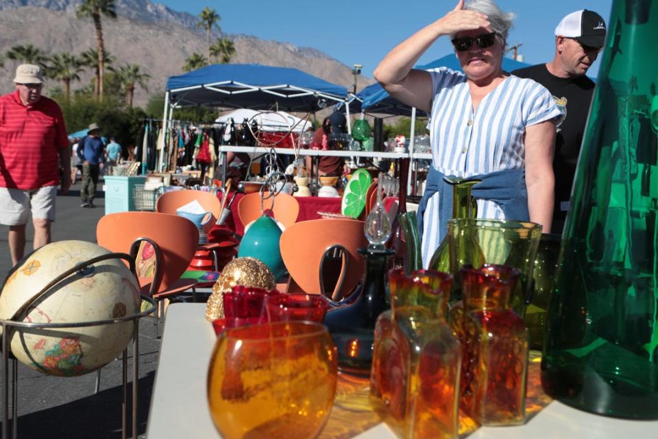 People shop for vintage items at the Palm Springs Vintage Market held outside the Palm Springs Cultural Center in Palm Springs, Calif., on Sunday, November 3, 2019. 