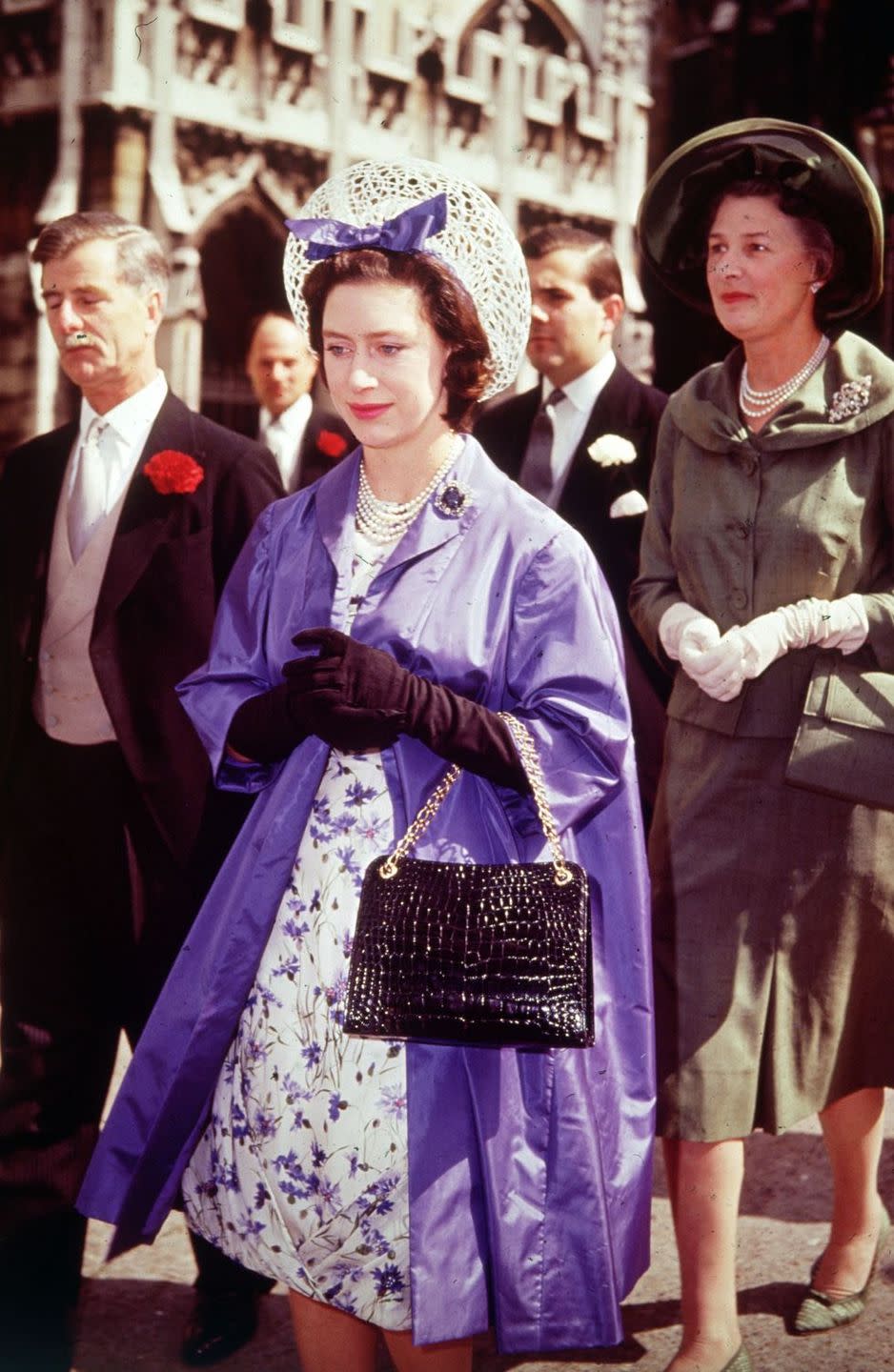 <p>Princess Margaret attends a wedding at Westminster Abbey in 1962</p>