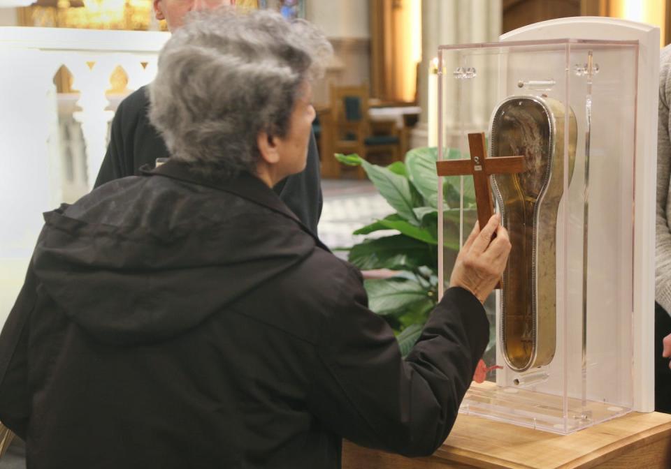 Catholics venerate the forearm of Saint Francis Xavier in Toronto in 2018. <a href="https://www.gettyimages.com/detail/news-photo/catholics-venerate-the-forearm-of-saint-francis-xavier-a-news-photo/904488528?adppopup=true" rel="nofollow noopener" target="_blank" data-ylk="slk:Creative Touch Imaging Ltd./NurPhoto via Getty Images;elm:context_link;itc:0;sec:content-canvas" class="link ">Creative Touch Imaging Ltd./NurPhoto via Getty Images</a>