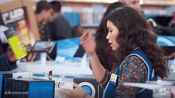 America Ferrera looks stressed while working retail on "Superstore"