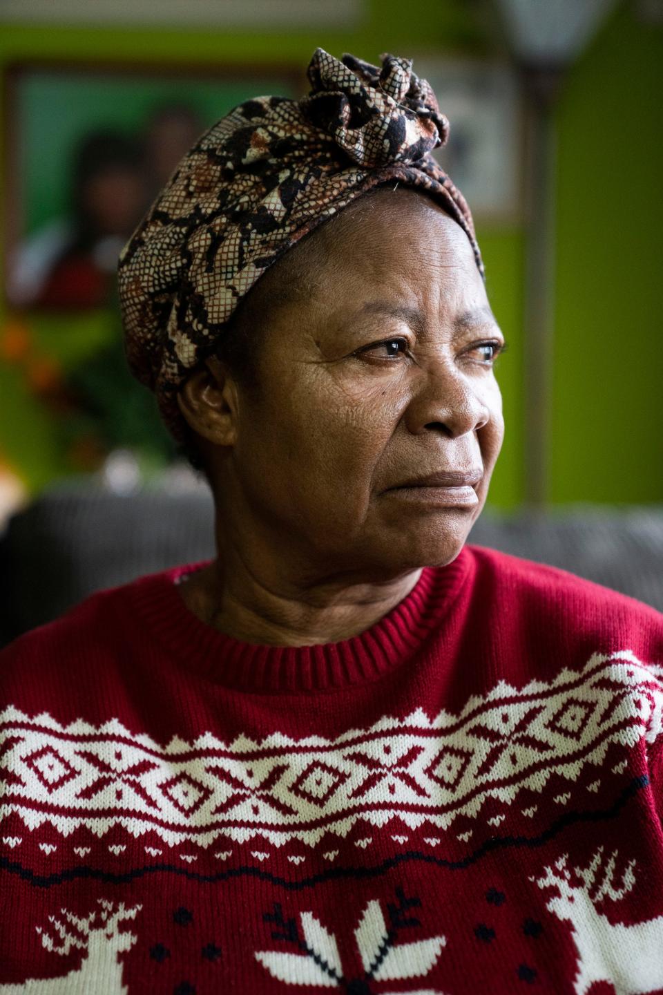 Dora Afrane poses for a portrait in the home she shares with her family. Her grandson Kofi Debrah was an 11th grader at Westerville North High School when he became a “person of interest” in a child pornography case after two girls shared nude images of themselves on the Snapchat messaging app, which they said someone was using to “extort” them. Kofi, who denied to his family doing anything with the photos, died by suicide shortly after meeting with police.