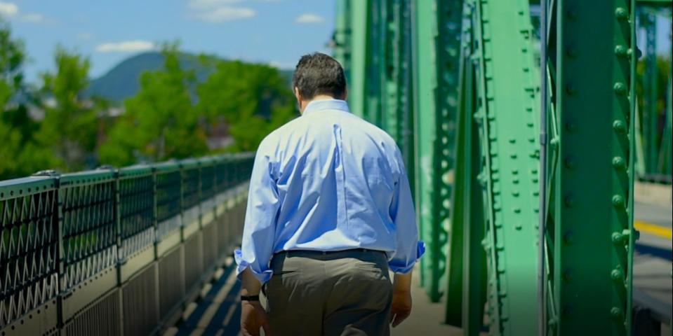 Tom Nichols on the Willimansett Bridge in his hometown of Chicopee, Mass.