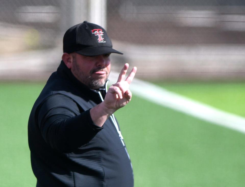 Texas Tech's head softball coach Craig Snider gestures to one of his athletes during a scrimmage, Sunday, Feb. 4, 2024, at Rocky Johnson Field.