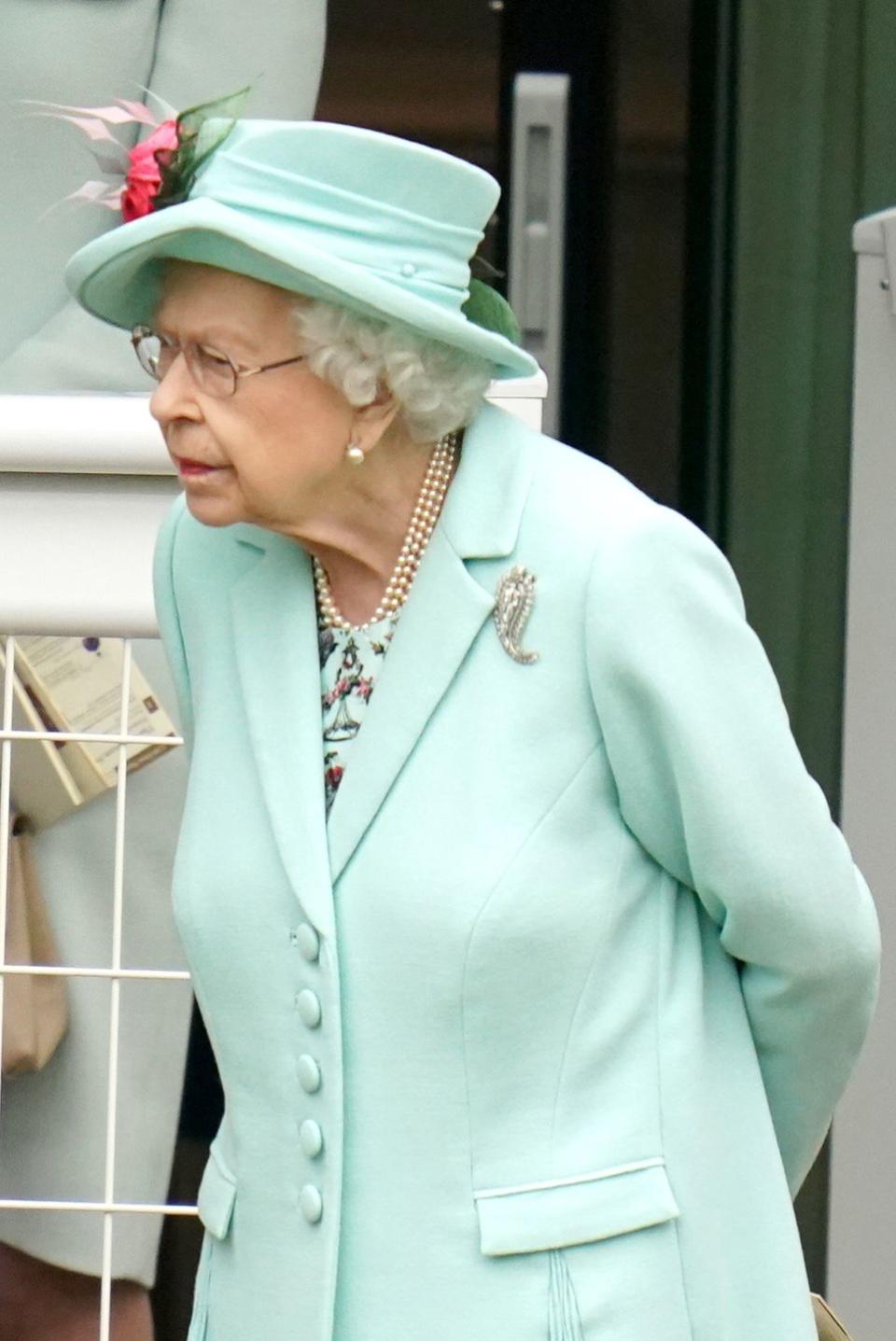 <p>For today's events, the Queen opted for a pale blue ensemble with a matching hat adorned with striking pink flowers.</p>