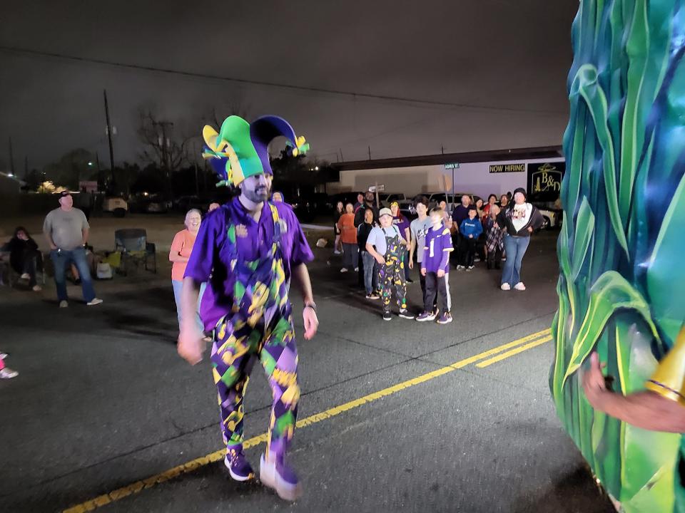 Jason Derouen, "The Cajun Ninja," leapt from his float to argue with a man in the crowd who insulted his cooking, Saturday, February 10, during the Krewe of Mardi Gras parade. Derouen is the Grand Marshal.