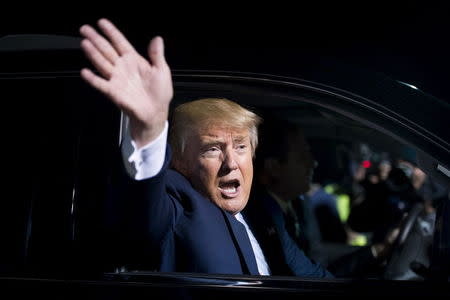 U.S. Republican presidential candidate Donald Trump waves to the crowd after a campaign rally in Tynsboro, Massachusetts, October 16, 2015. REUTERS/Gretchen Ertl