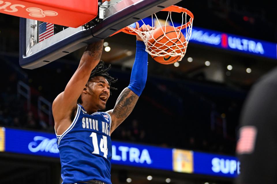 Jan 9, 2024; Washington, District of Columbia, USA; Seton Hall Pirates guard Dre Davis (14) dunks the ball against the Georgetown Hoyas during the first half at Capital One Arena. Mandatory Credit: Brad Mills-USA TODAY Sports