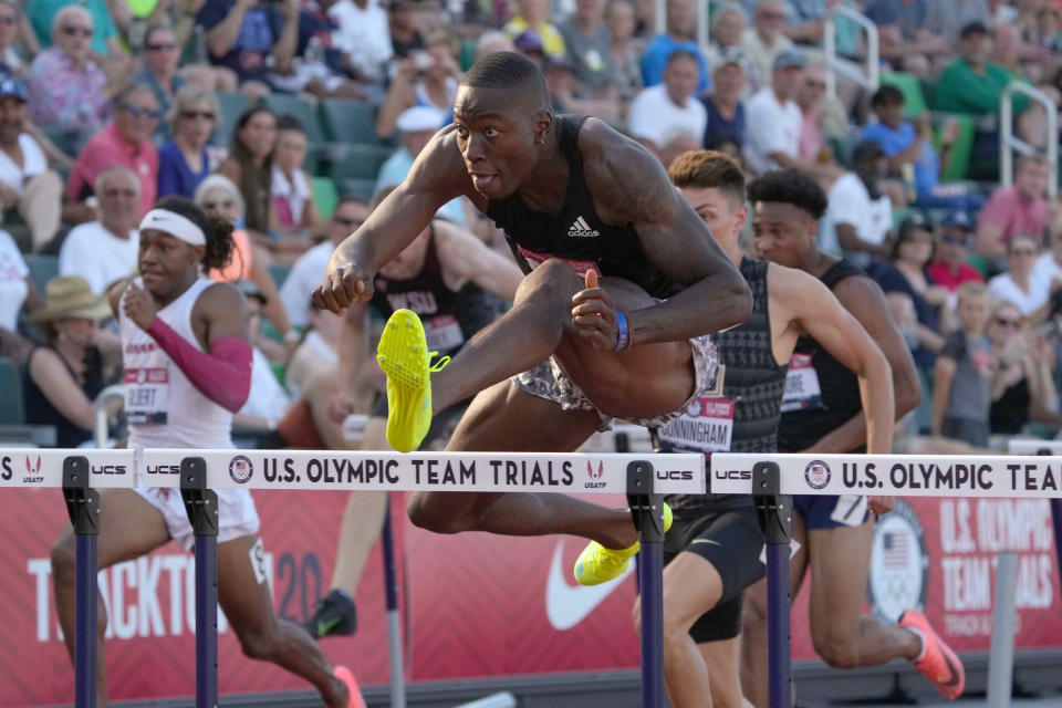 Grant Holloway set a U.S. record in the 60 meter hurdles with a time of 7.35 seconds.