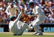 Cricket - Australia v South Africa - First Test cricket match - WACA Ground, Perth, Australia - 3/11/16 Australia's Shaun Marsh celebrates with wicketkeeper Peter Nevill after taking a catch to dismiss South Africa's Temba Bavuma. REUTERS/David Gray