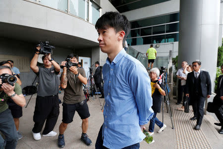 Disqualified lawmaker Baggio Leung arrives at a magistrate court in Hong Kong, China, June 4, 2018. REUTERS/Bobby Yip