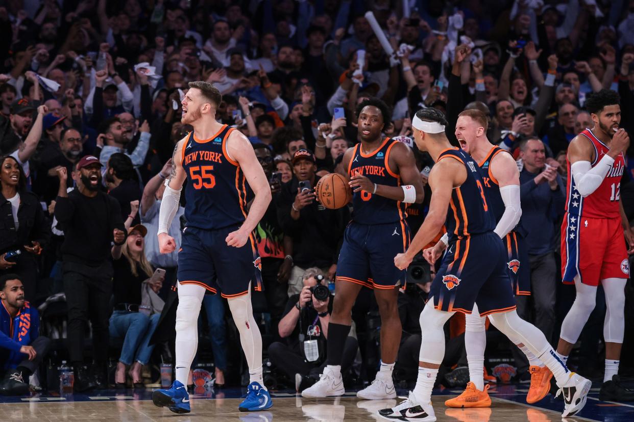 Apr 22, 2024; New York, New York, USA; New York Knicks center Isaiah Hartenstein (55) celebrates wit teammates after blocking a shot by Philadelphia 76ers guard Tyrese Maxey (not pictured) during the fourth quarter during game two of the first round for the 2024 NBA playoffs at Madison Square Garden. Mandatory Credit: Vincent Carchietta-USA TODAY Sports