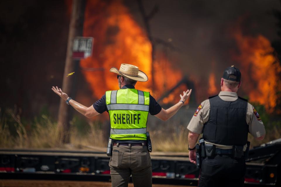 The Bastrop County sheriff's department had evacuated some businesses and residences Tuesday because of a fire near Bastrop State Park. People were allowed to return around 9 p.m. Tuesday.