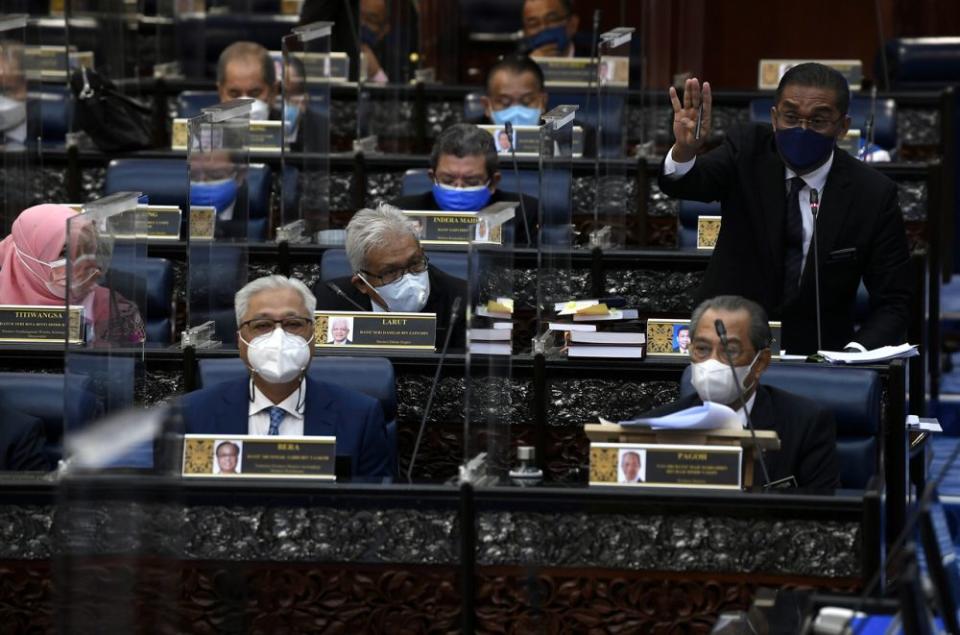 Datuk Seri Takiyuddin Hassan addresses members of Parliament during a special sitting on July 26, 2021. — Bernama pic