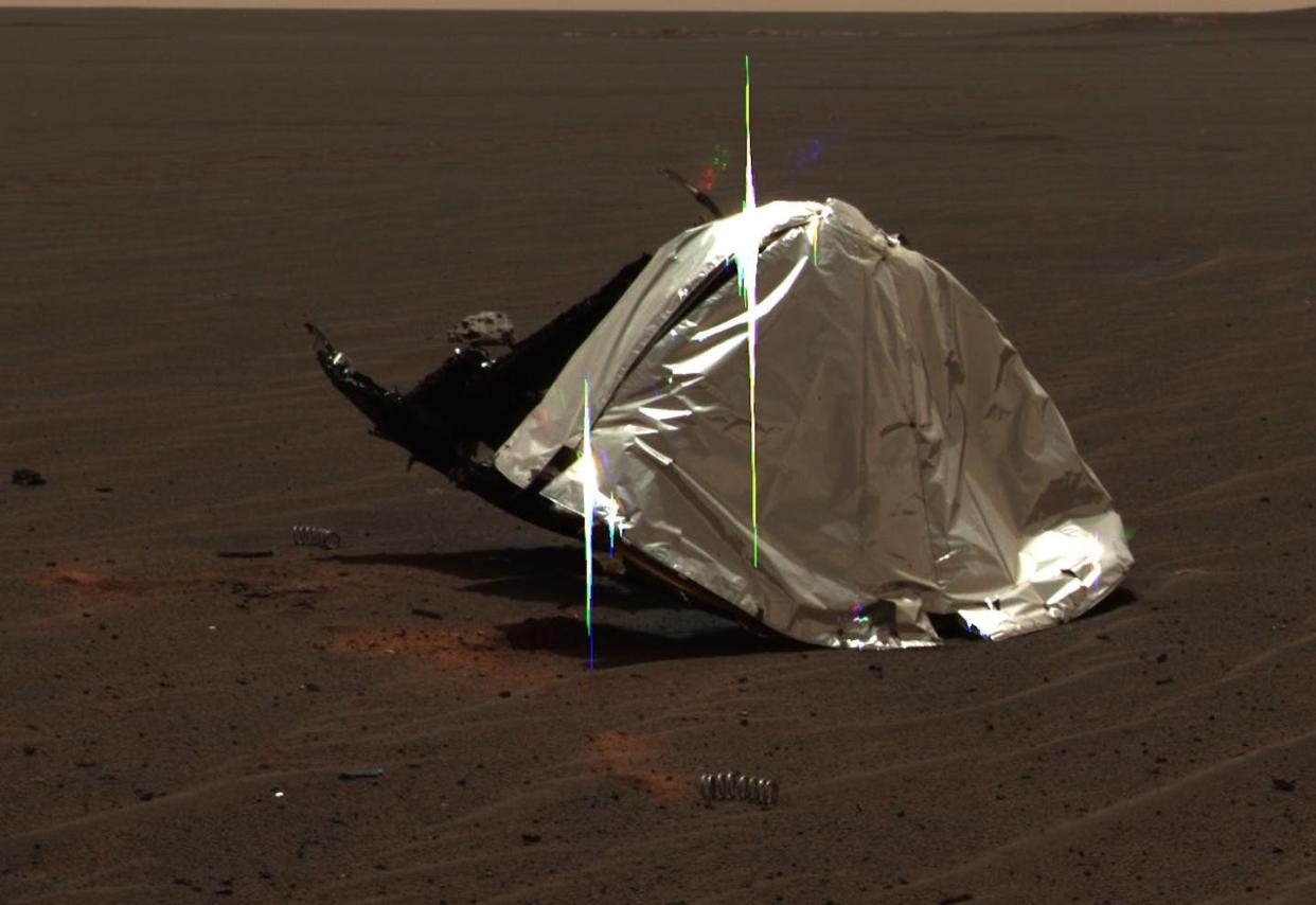 Rovers on Mars frequently come across debris – like this heat shield and spring – from their own or other missions. <a href="https://mars.nasa.gov/resources/5853/opportunitys-heat-shield-in-color-sol-335/" rel="nofollow noopener" target="_blank" data-ylk="slk:NASA/JPL-Caltech;elm:context_link;itc:0;sec:content-canvas" class="link ">NASA/JPL-Caltech</a>