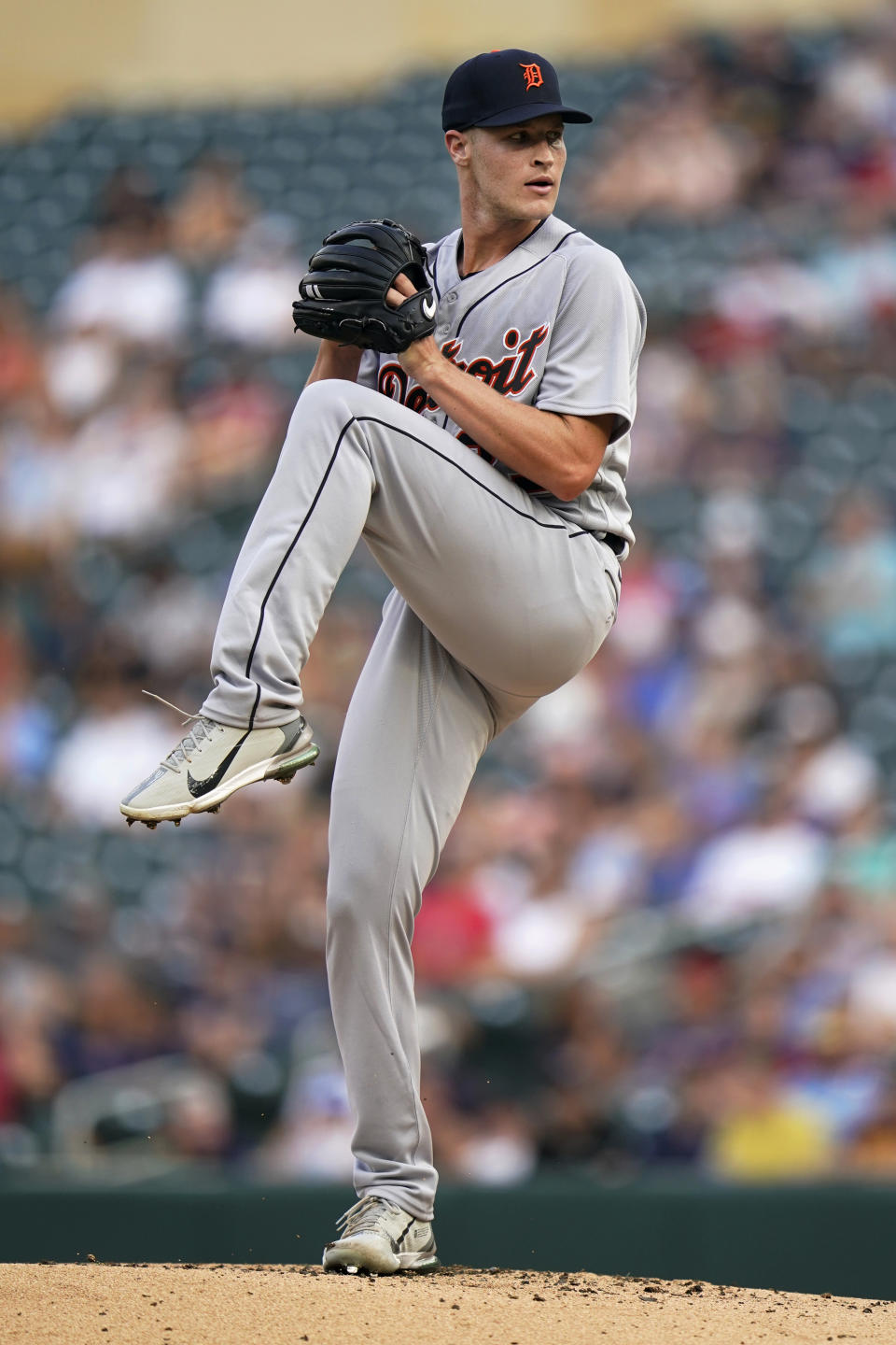 Detroit Tigers starting pitcher Matt Manning winds up during the first inning of the team's baseball game against the Minnesota Twins on Tuesday, Aug. 2, 2022, in Minneapolis. (AP Photo/Abbie Parr)