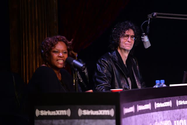 <p>Mike Coppola/Getty</p> Robin Quivers and Howard Stern in 2014.