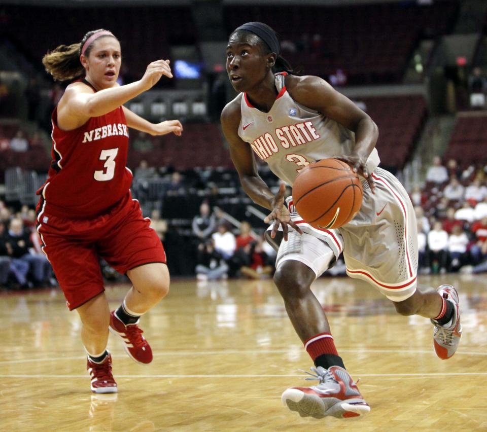 Ohio State's Amber Stokes drives to the basket as Nebraska's Hailie Sample defends during the first half on Thursday, Jan. 19, 2012, in Columbus. Ohio State won 82-68.
