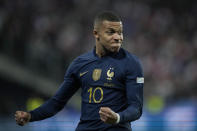 France's Kylian Mbappe celebrates scoring his side's first goal during the UEFA Nations League soccer match between France and Austria at the Stade de France stadium in Saint Denis, outside Paris, France,Thursday, Sept. 22, 2022. (AP Photo/Christophe Ena)