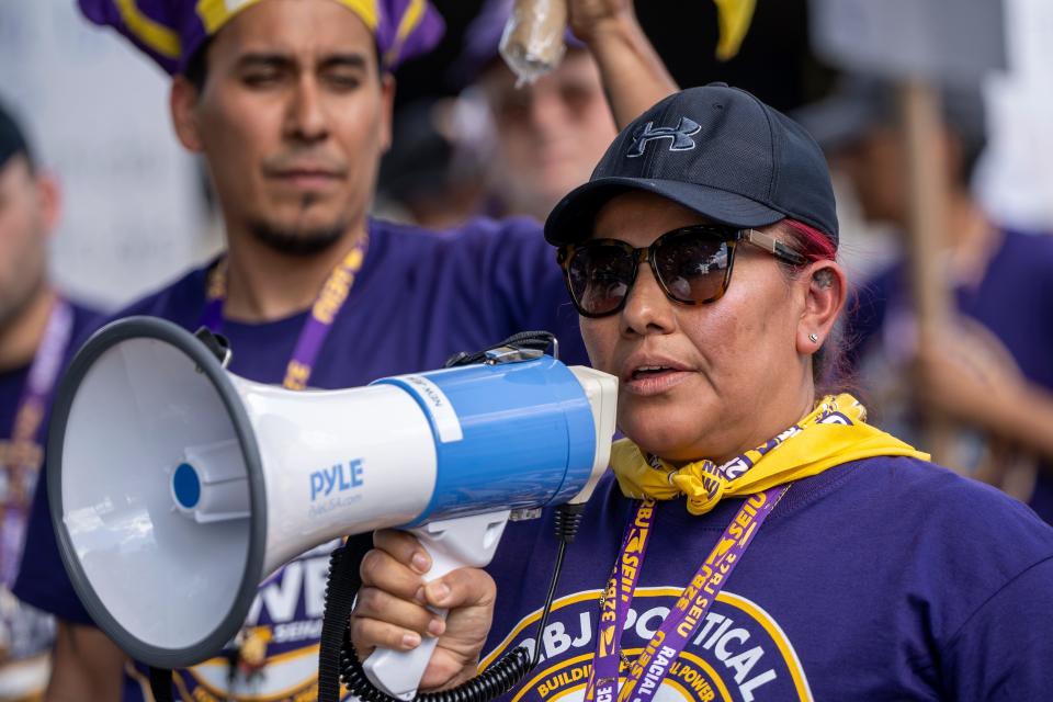 Jun 27, 2024; East Rutherford, NJ, USA; Guadalupe Montiel, a worker with HSA, the company that cleans American Dream, uses a megaphone during a protest against unfair labor practices on a one day strike.