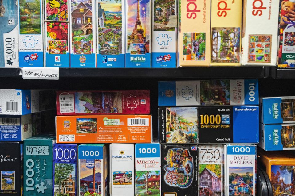 Books and puzzles are in the storage room of the Basco Library, on Feb. 16, 2022, in preparation for the upcoming Friends of Erie County Library's Great American Book Sale.