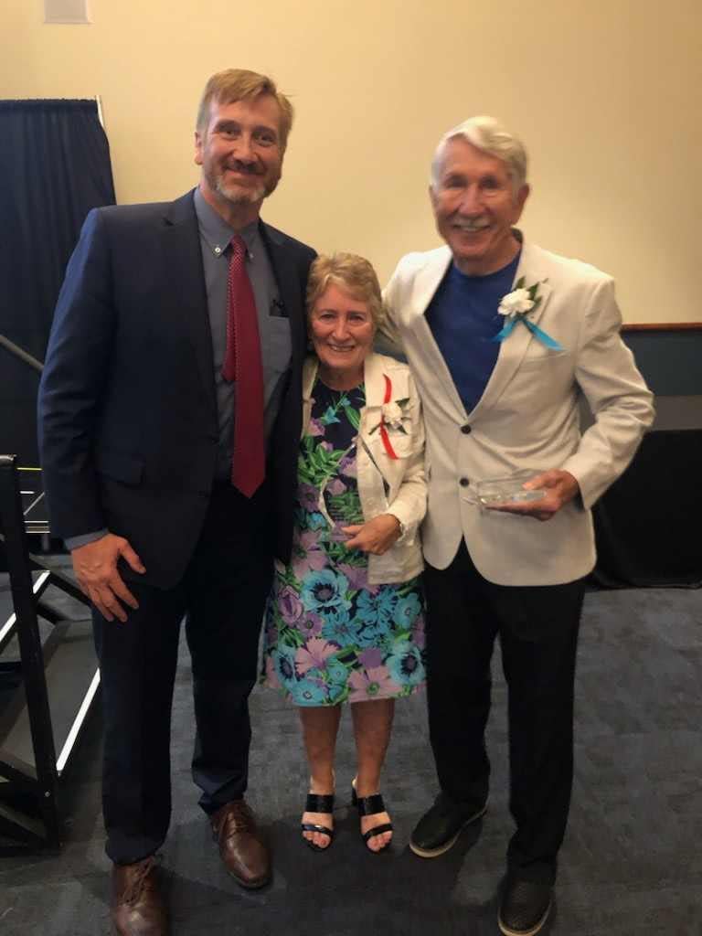 Cheryl and John Haschak received the Lifetime Achievement Award from the Stark County Educational Service Center for their many years in education. Pictured with the couple is ESC Superintendent Joe Chaddock, left.