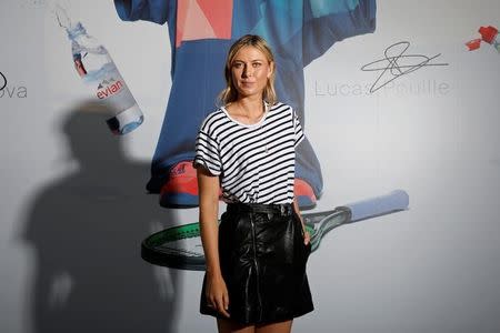 Maria Sharapova of Russia poses for a photo at a promotional event for the upcoming French Open tennis tournament in Paris, France, May 23, 2017. REUTERS/Benoit Tessier