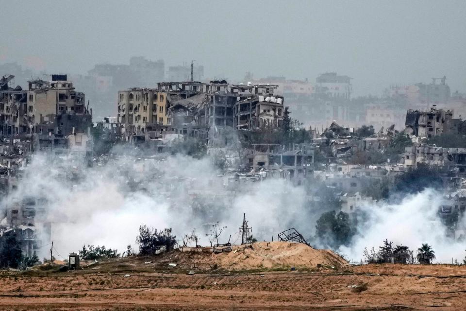 In this photograph taken near the Israeli border with the Gaza Strip, smoke rises over Beit Hanoun in Northern Gaza after an israeli air strike on 22 November 2023 in Sederot, Israel (Getty Images)
