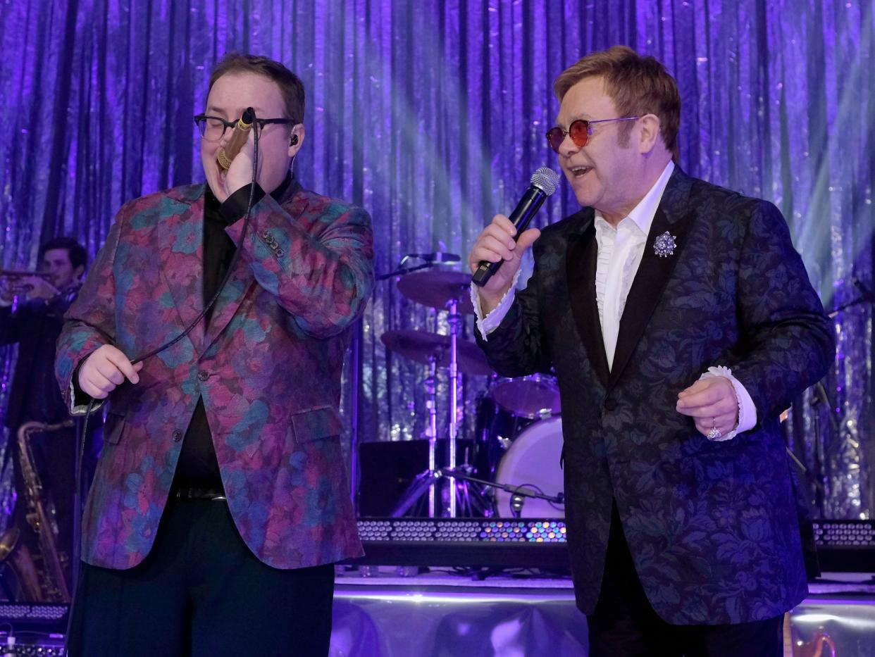 Paul Janeway and Elton John perform together. (Photo: Dimitrios Kambouris/Getty Images for EJAF)