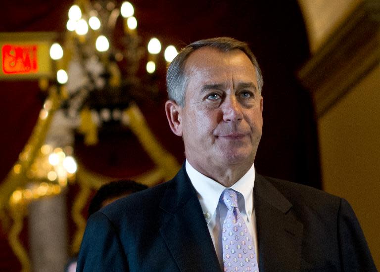 US House Speaker John Boehner arrives at the House of Representatives chamber at the US Capitol on September 28, 2013 in Washington