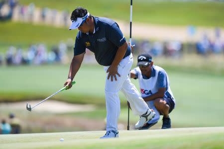 Jun 16, 2018; Southampton, NY, USA; Kiradech Aphibarnrat reacts on the seventeenth green during the third round of the U.S. Open golf tournament at Shinnecock Hills GC - Shinnecock Hills Golf C. Mandatory Credit: Dennis Schneidler-USA TODAY Sports