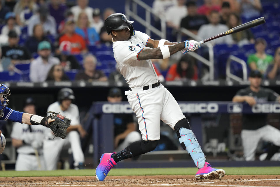 Miami Marlins' Jorge Soler hits a two-run home run during the third inning of a baseball game against the Toronto Blue Jays, Monday, June 19, 2023, in Miami. (AP Photo/Lynne Sladky)