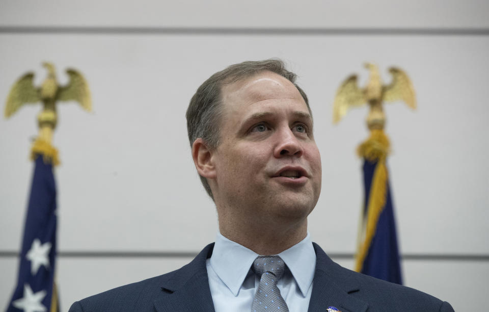 Administrator of the National Aeronautics and Space Administration (NASA) Jim Bridenstine speaks during a news conference at the U.S. embassy in Moscow, Russia, Friday, Oct. 12, 2018. (AP Photo/Pavel Golovkin)