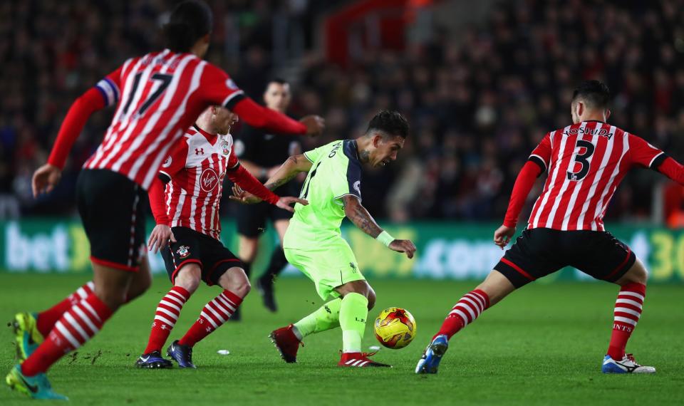 <p>Roberto Firmino takes on the Southampton defenders (Getty Images) </p>