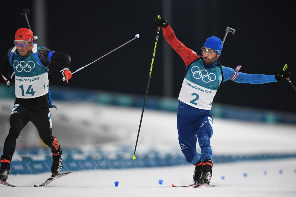 Fourcade en or sur la mass-start grâce à la photo-finish (AFP).