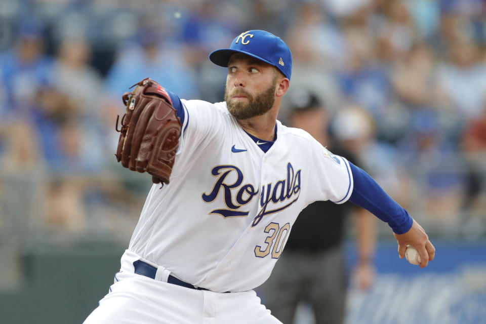 Kansas City Royals pitcher Danny Duffy throws against a Baltimore Orioles batter in the first inning of a baseball game at Kauffman Stadium in Kansas City, Mo., Friday, July 16, 2021. (AP Photo/Colin E. Braley)